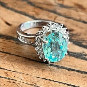 BTV296-7.5
18KT AQUAMARINE DIAMOND
6.01CT DIAMOND STUDS 1.08CTW DIAMOND RING